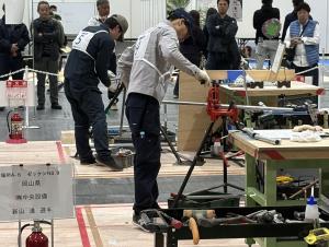 建築配管競技の写真