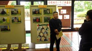 テレビカメラで撮影される研究会会長